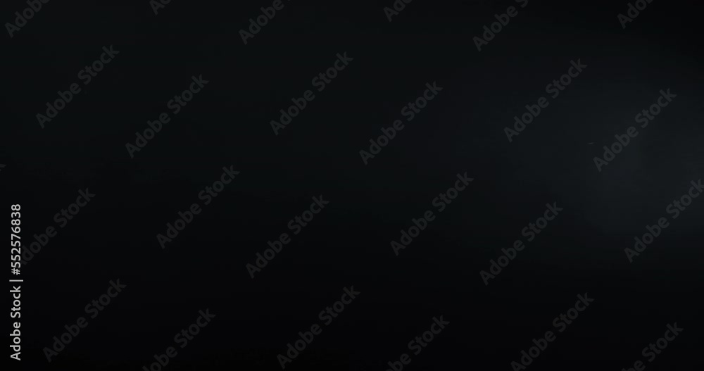 Layered VFX atmosphere. 4K slow-motion VFX smoke appears from the side on a black, moves slowly, and lingers disturbed by a subtle wind. Featuring real hanging smoke and practical non-sourced smoke. Layered VFX atmosphere. 4K slow-motion VFX smoke appears from the side on a black, moves slowly, and lingers disturbed by a subtle wind. Featuring real hanging smoke and practical non-sourced smoke.