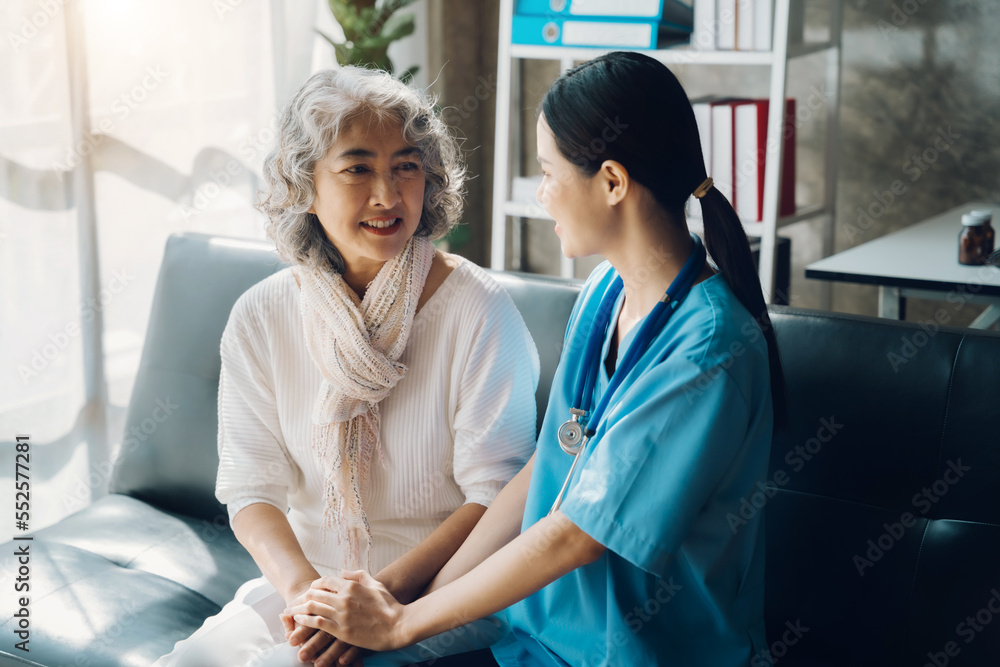 Obraz premium Asian doctor women and patient discussing while sitting. Medicine and health care concept.