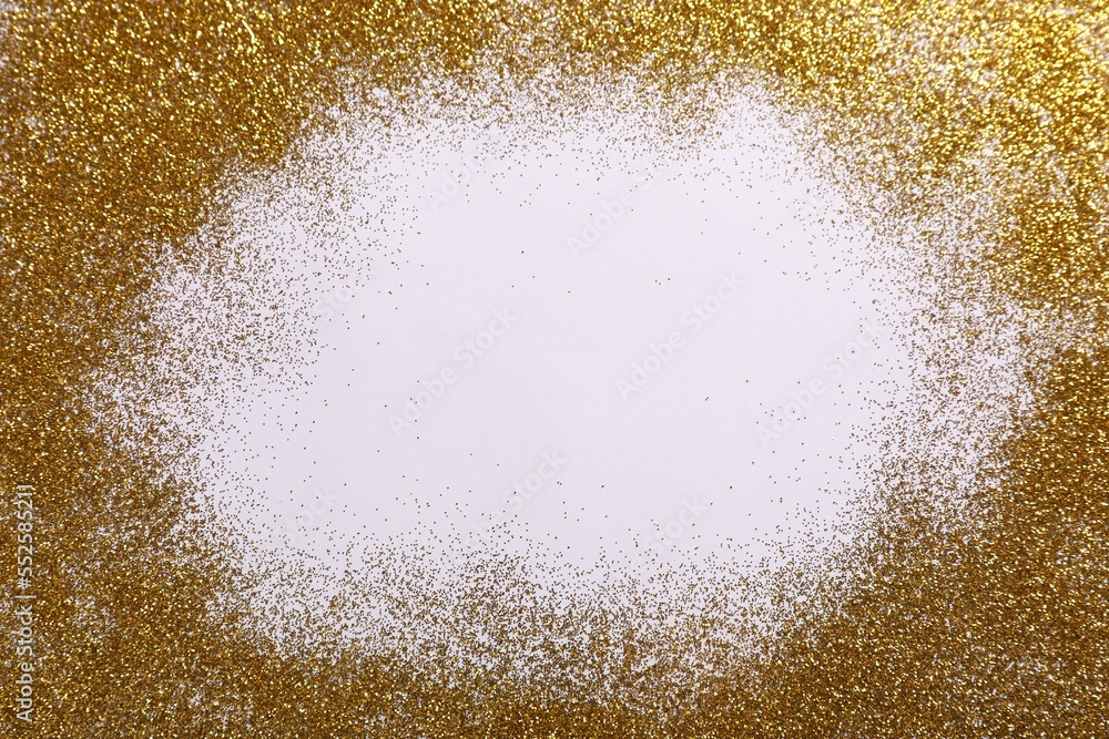 Frame made of shiny golden glitter on white background, top view Frame made of shiny golden glitter on white background, top view