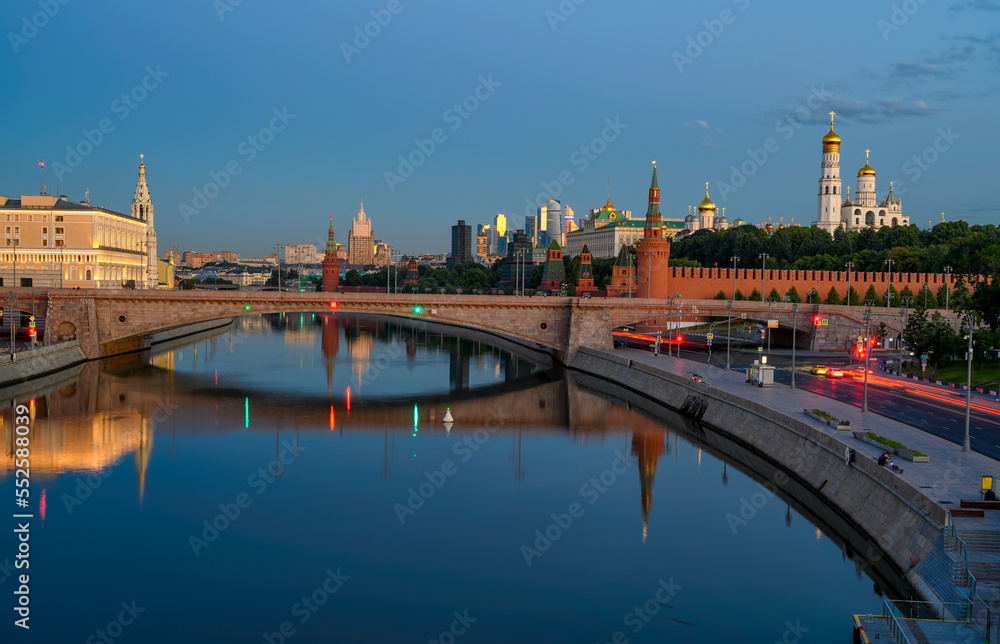 Night view of Moscow Kremlin and Moskvoretskaya embankment in Moscow, Russia. Architecture and landmarks of Moscow. Postcard of Moscow