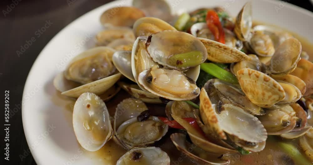Taiwanese local seafood cuisine fry clam in restaurant Taiwanese local seafood cuisine fry clam in restaurant