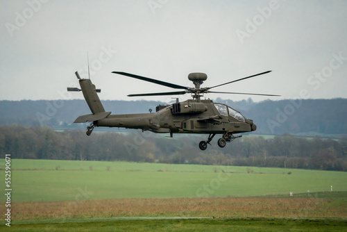 close up of an army combat helicopter preparing to land 
