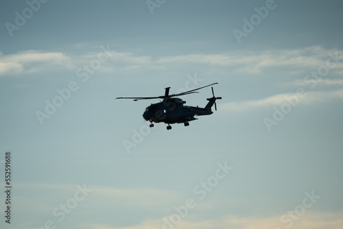 Fototapeta Naklejka Na Ścianę i Meble -  British Joint Helicopter Command (JHC) Royal Air Force Puma HC2 Helicopter on a military exercise, winter sky, Wiltshire UK