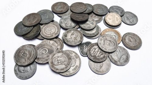 Old coins on white background, rare coins photo
