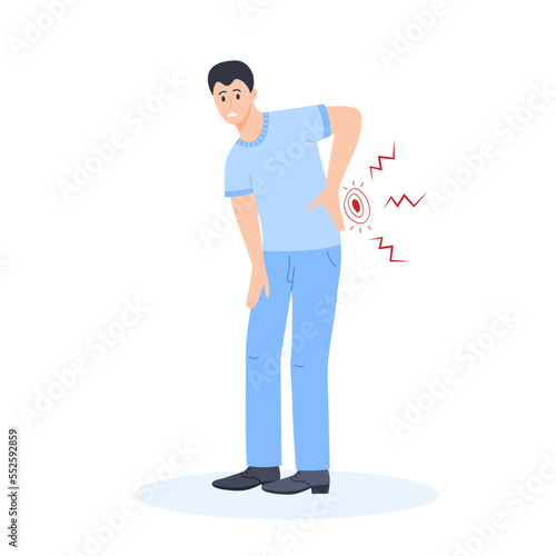 Sad man holding his small of the back. Chronic, nagging or sharp backache. Healthcare, medicine concept.