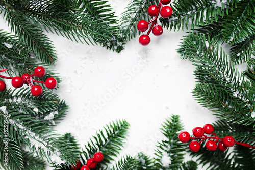 beautiful layout with Christmas decorations and snow isolatesd on white background. frame flat lay composition . copy space. top view. photo