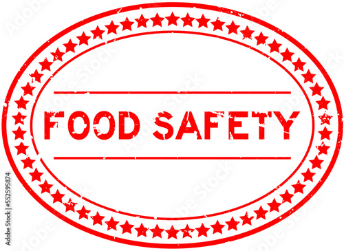 Grunge red food safety word oval rubber seal stamp on white background