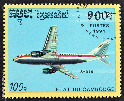 Cancelled postage stamp printed by Cambodia, that shows Airplane Airbus Industrie A310, circa 1991. photo