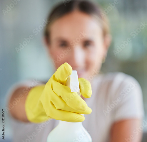 Valokuva Hand, spray bottle and cleaning with a woman in gloves for housework or sanitization for hygiene