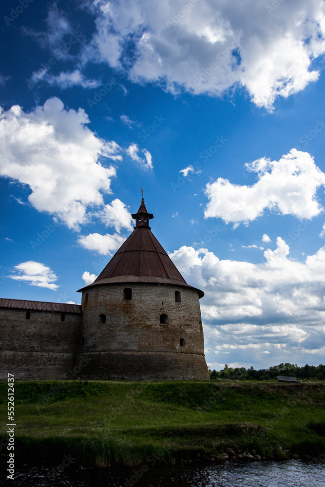 Oreshek fortress tower against a cloudy sky.