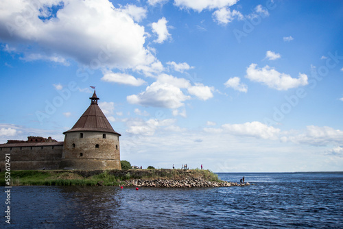 The tower of the Oreshek fortress on the background of Ladoga