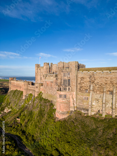 Photography Beautiful aerial view of historic Bamburgh Castle in Northumberland, UK