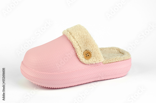 Warm room slippers with fur on a white background