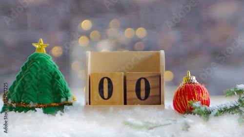 Golden merry christmas text with bokeh lights in the background