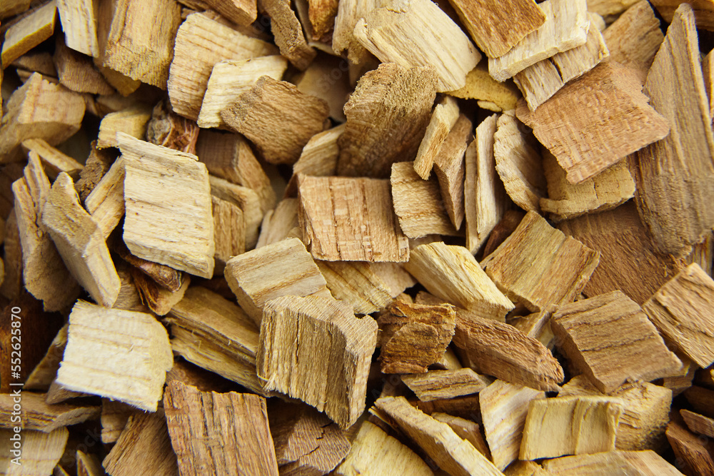 Wood chips for smocking texture background. Natural wood smoking chunks, top view Wood chips for smocking texture background. Natural wood smoking chunks, top view