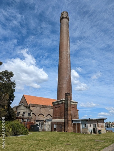 The very tall brick chimney that was attached to the coal power station built to supply the dockyards at the naval base at Cockatoo Island, Sydney, australia.