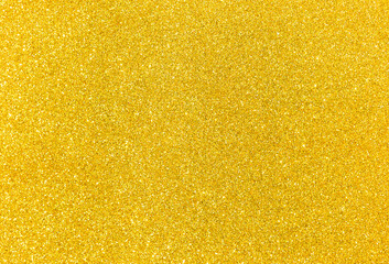 Abstract blurred gold glitter background, shiny golden texture background, Christmas and New year background