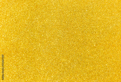 Abstract blurred gold glitter background, shiny golden texture background, Christmas and New year background