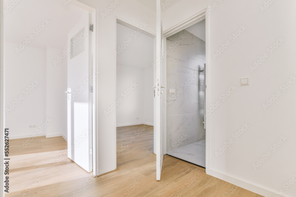 Doorway of modern apartment with white walls and parquet floor Doorway of modern apartment with white walls and parquet floor