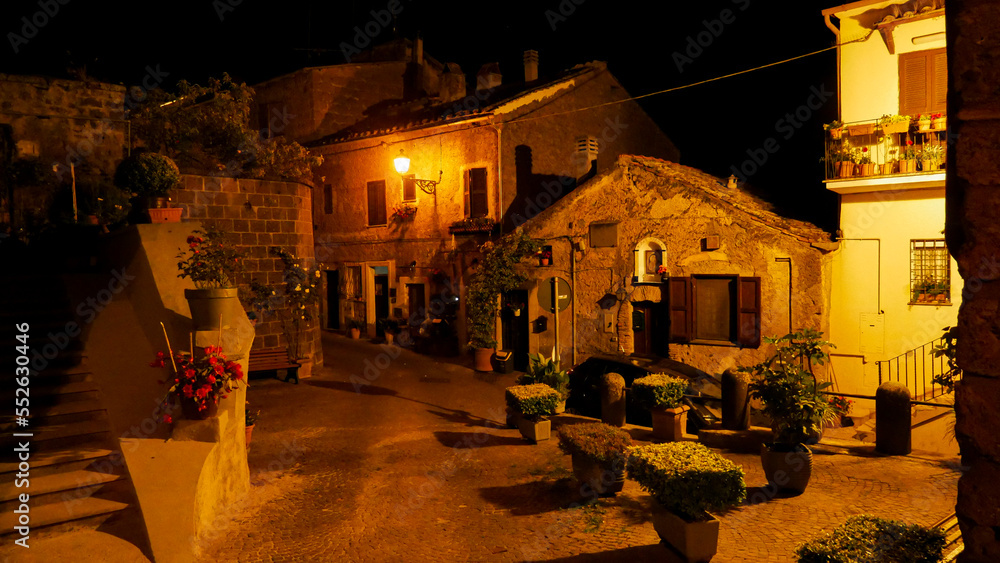 Little village in Tuscany by night with warm light