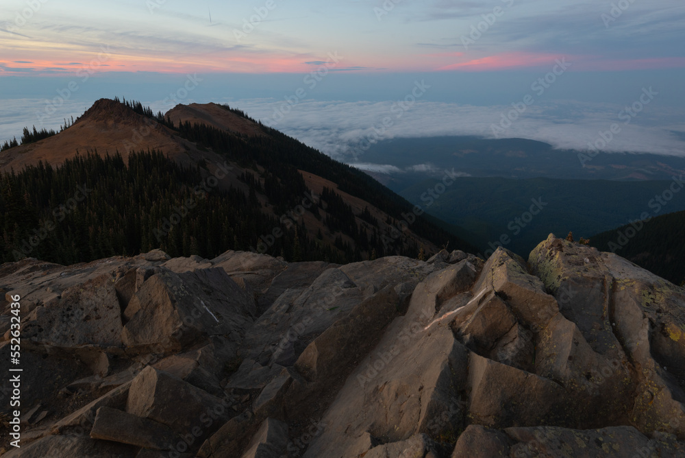 Sunset with fog over Puget Sound from mountain summit