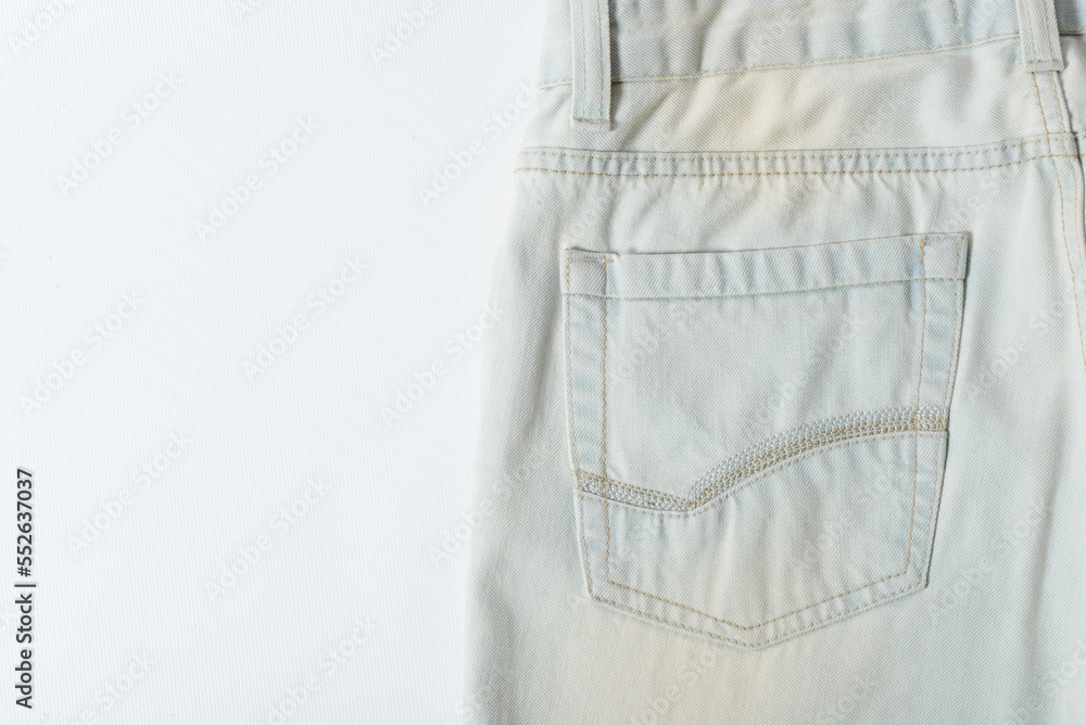 Close up shot back pocket of a ice blue jeans. Close up shot back pocket of a ice blue jeans.
