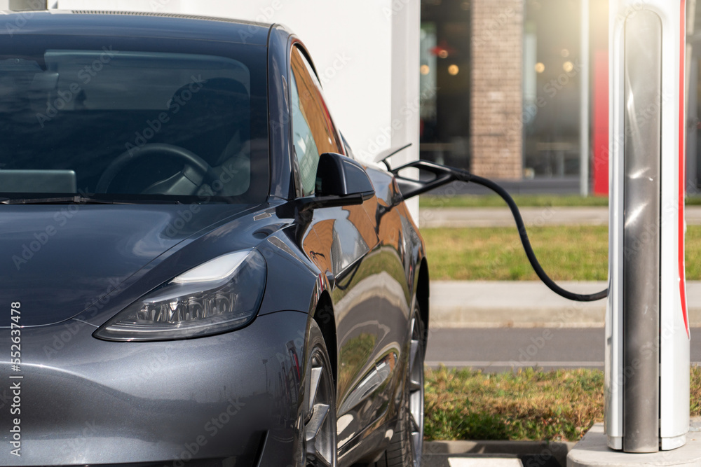 Electric car with a charging station Electric car with a charging station