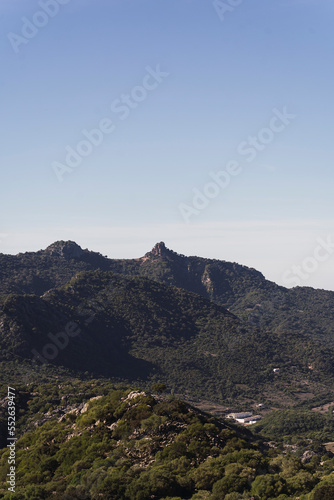 Paisaje de montaña junto a pueblo blanco andaluz en la provincia de cadiz © MiguelAngelJunquera