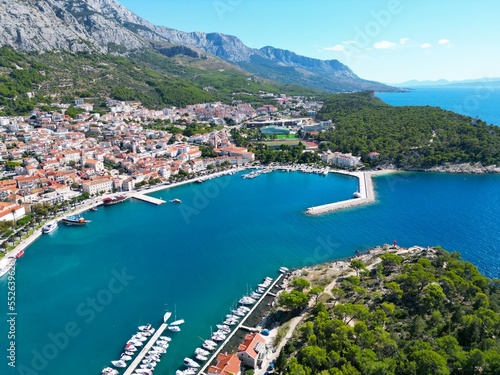 Makarska town Croatia Dalmatian coast high angle drone aerial view ..
