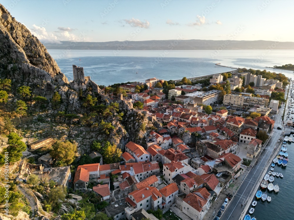  Omis town and port  at sunset Croatia Aerial drone ..