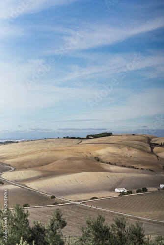 Paisaje de montaña junto a pueblo blanco andaluz en la provincia de cadiz photo