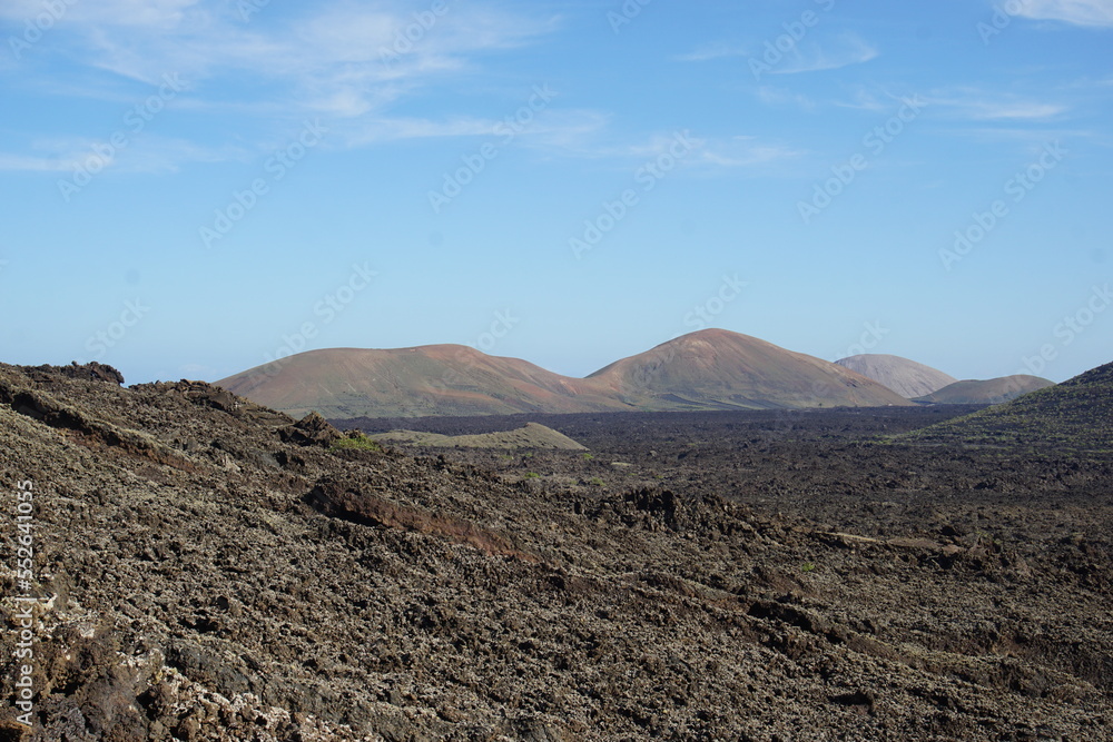 volcanic landscapes of lanzarote, photographed in november 2022. trekking day trip. Crater, volcano, sea of lava, solidified lava, landscape, sony a6000