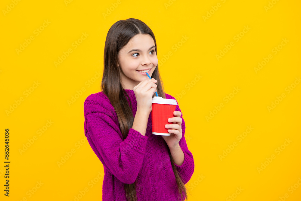 Teenage girl with take away cup of cappuccino coffee or tea. Child with takeaway cup on yellow background, morning drink beverage. Teenage girl with take away cup of cappuccino coffee or tea. Child with takeaway cup on yellow background, morning drink beverage.