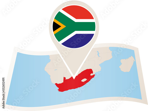 Folded paper map of South Africa with flag pin of South Africa. 
