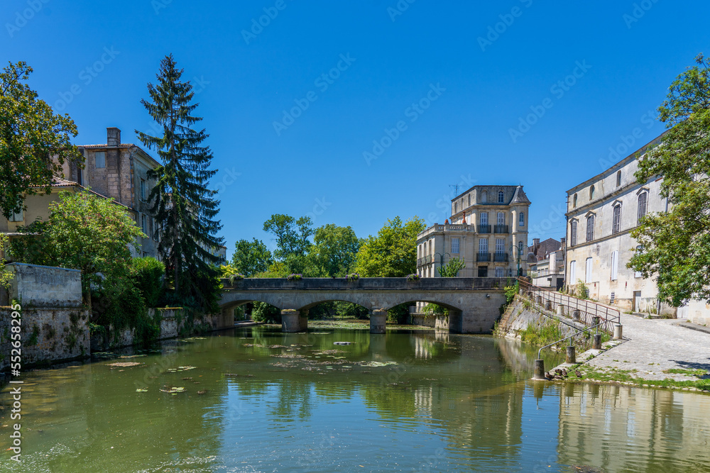 A town view of a river in the French city of Jonzac