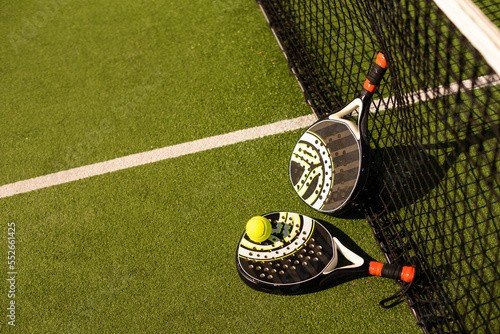 Paddle tennis objects and court. photo