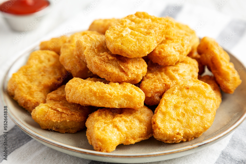 Homemade Chicken Nuggets with Ketchup, low angle view. Close-up. Homemade Chicken Nuggets with Ketchup, low angle view. Close-up.