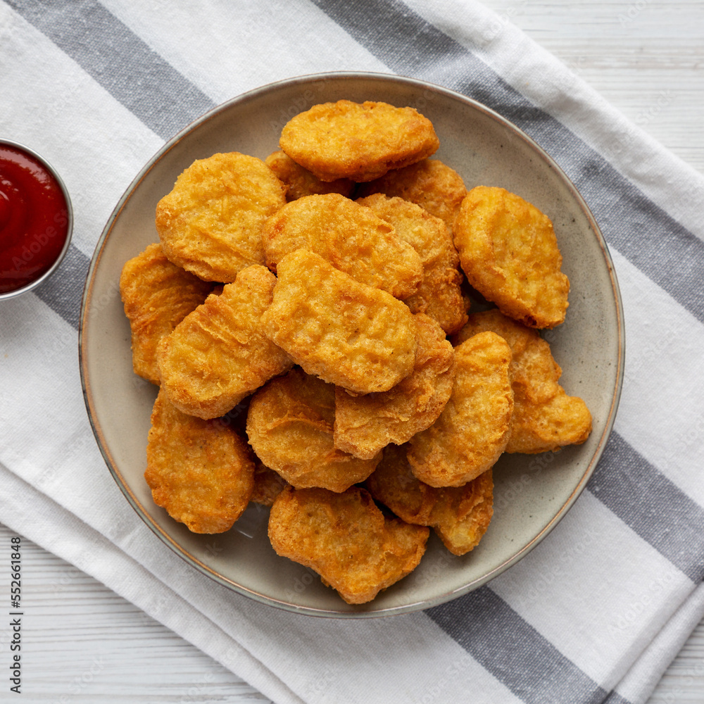 Homemade Chicken Nuggets with Ketchup, top view. Flat lay, overhead, from above. Homemade Chicken Nuggets with Ketchup, top view. Flat lay, overhead, from above.