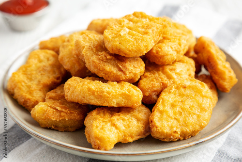 Fotografía Homemade Chicken Nuggets with Ketchup, low angle view. Close-up.