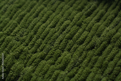 Obraz na płótnie Monochrome background of cozy green knitted sweater w salonie