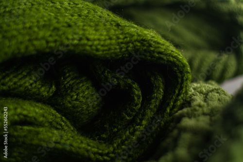 Obraz na płótnie Monochrome background of cozy green knitted sweater w salonie