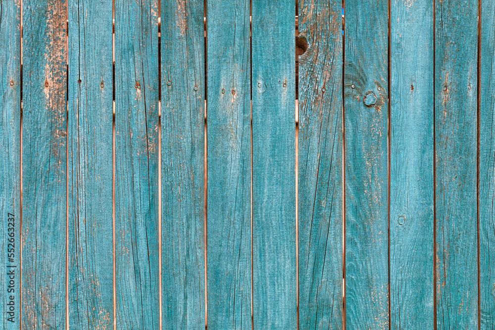 Old wooden fence with faded green paint texture. Old wooden fence with faded green paint texture.