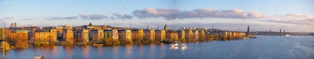 Panorama view over the water front of the island Kungsholmen, the skyline of the old town and the town city hall a pale winter day in Stockholm