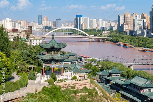 Panoramic view of the downtown of Lanzhou crossed by the Yellow river; Gansu province, China photo
