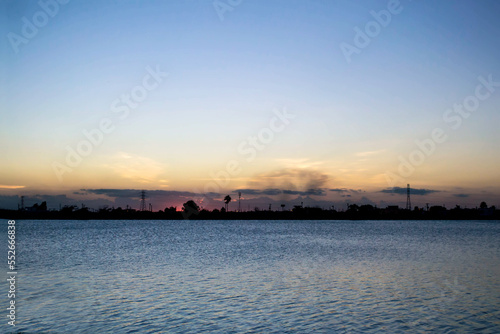Sky and water Pollution of the environment at sunset Night horizon © René Sandoval Jr