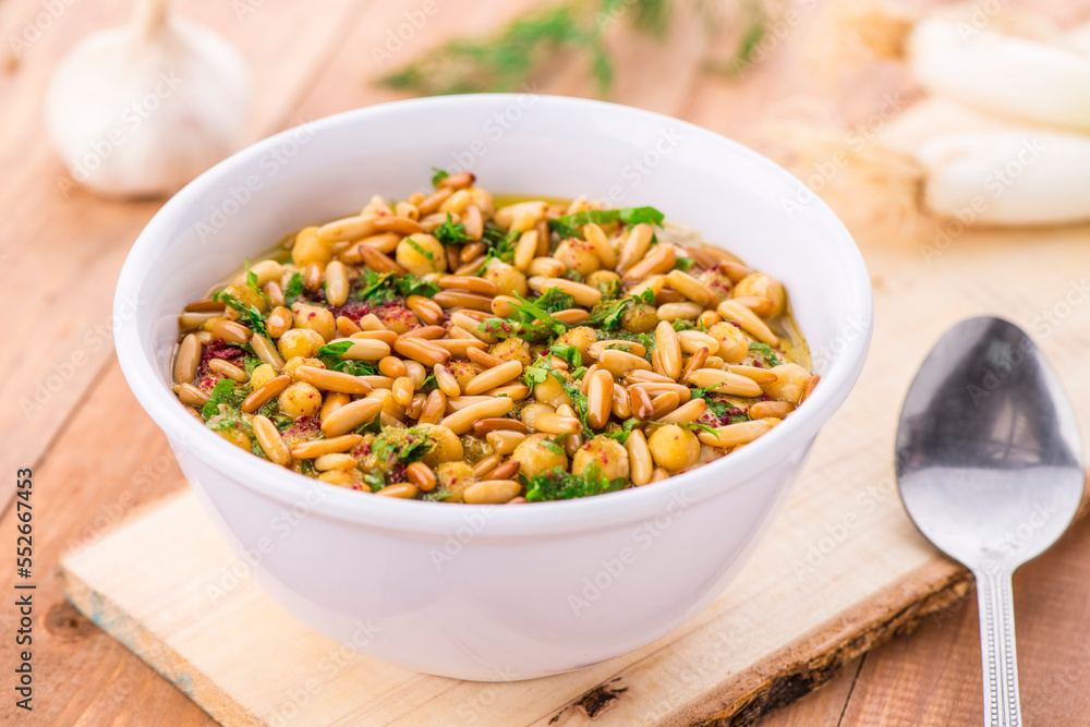 Spicy gesture snack served in dish isolated on table side view of arabic food Spicy gesture snack served in dish isolated on table side view of arabic food