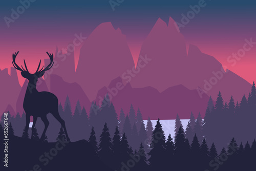 Deer with antlers posing on the top of the hill with mountains and the forest in the background.