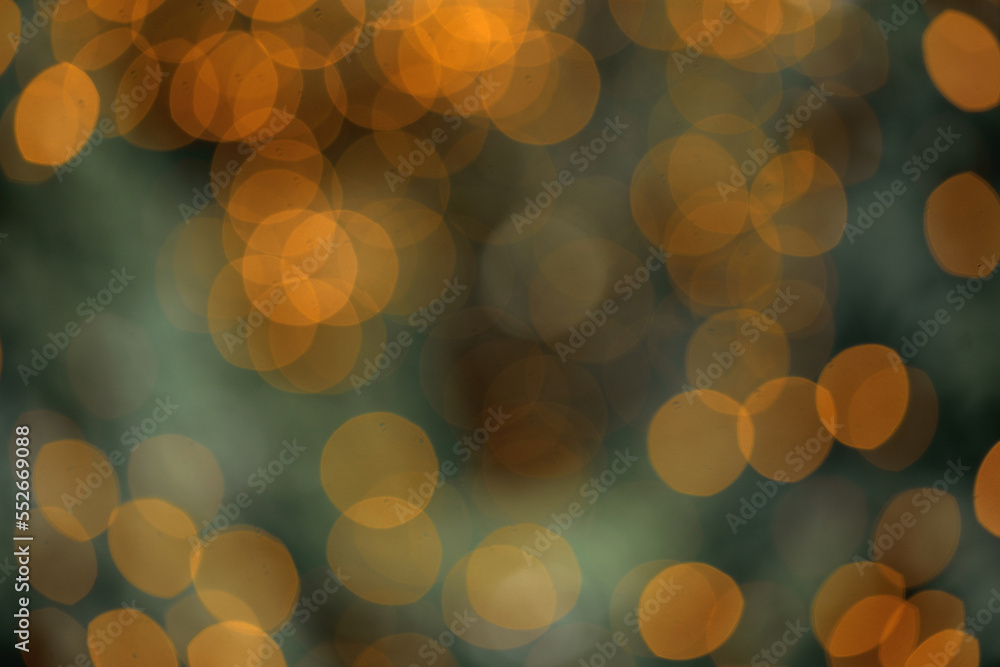 Abstract defocused bokeh background of illuminated Christmas decorations. Winter Holidays Concept Abstract defocused bokeh background of illuminated Christmas decorations. Winter Holidays Concept