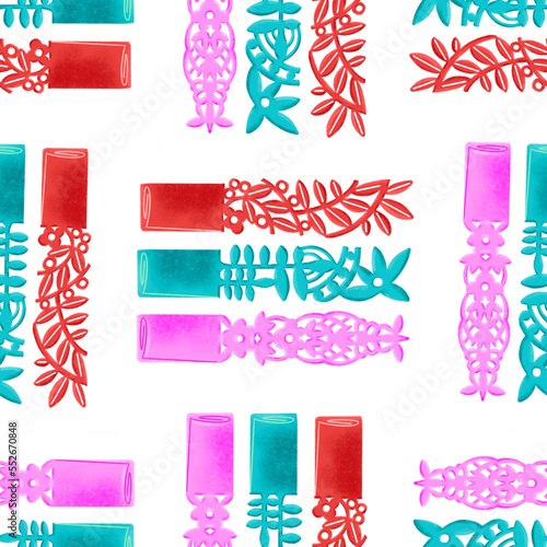 Filipino pastillas candy with handcut paper wrapper in pink, green, and red, grid illustrated pattern photo