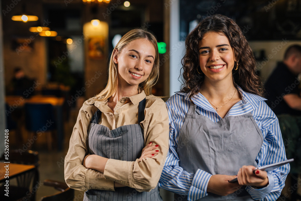 Two waitresses work in the same shift together